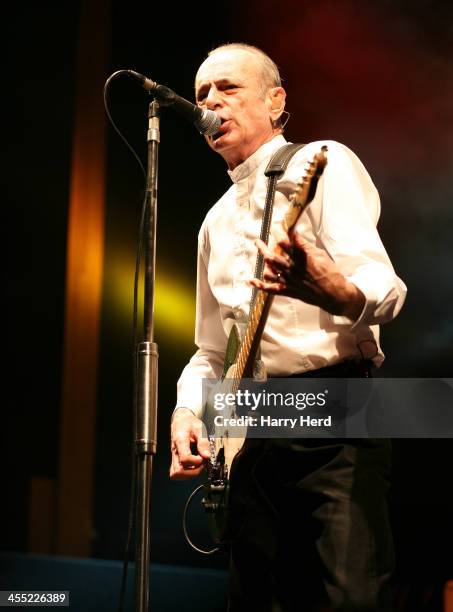 Francis Rossi of Status Quo performs on stage at BIC on December 11, 2013 in Bournemouth, United Kingdom.
