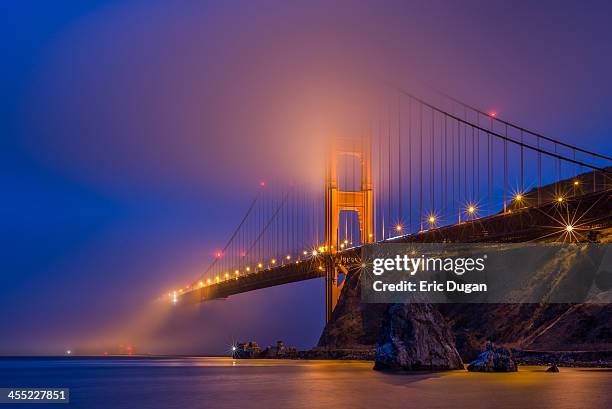 vanishing into the twilight zone - bridge fog stock pictures, royalty-free photos & images