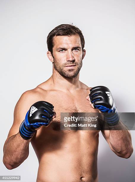 Luke Rockhold poses during the UFC Fight Night: Rockhold v Bisping Press Event at Museum of Contemporary Art on September 11, 2014 in Sydney,...