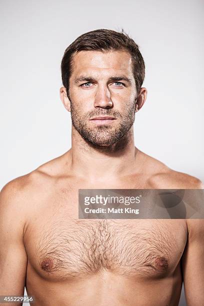 Luke Rockhold poses during the UFC Fight Night: Rockhold v Bisping Press Event at Museum of Contemporary Art on September 11, 2014 in Sydney,...