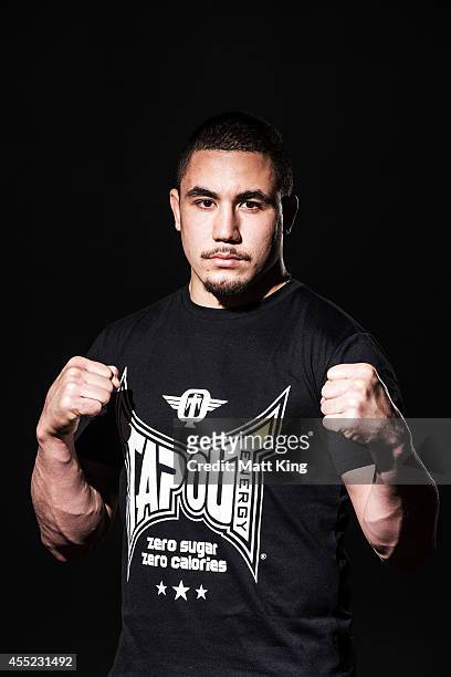 Robert Whittaker poses during the UFC Fight Night: Rockhold v Bisping Press Event at Museum of Contemporary Art on September 11, 2014 in Sydney,...