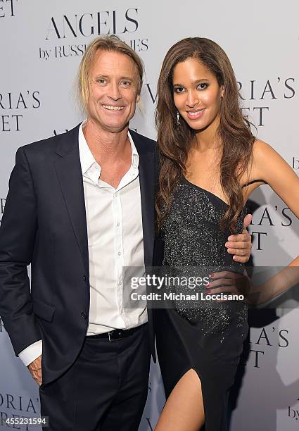 Photographer Russell James and model Keir Alexa attend Russell James' "Angels" book launch hosted by Victoria's Secret on September 10, 2014 in New...