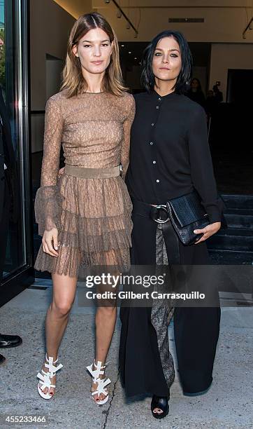 Hanneli Mustaparta and Leigh Lezark are seen at the Michael Kors fashion show during Mercedes-Benz Fashion Week Spring 2015 at Spring Studios on...