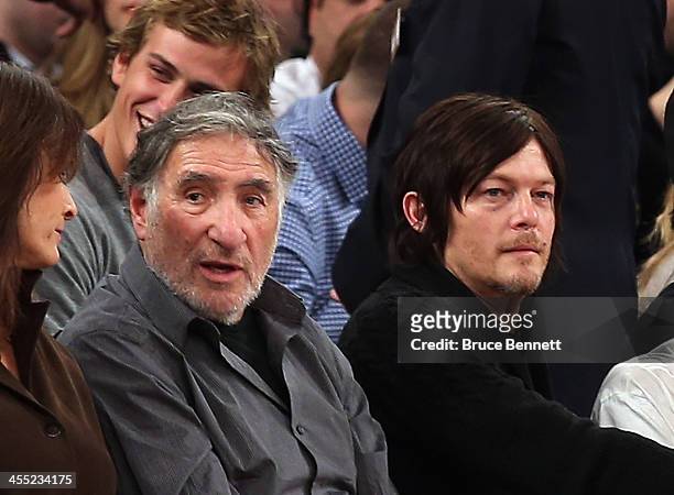 Judd Hirsch and Norman Reedus attend the game between the New York Knicks and the Chicago Bulls at Madison Square Garden on December 11, 2013 in New...