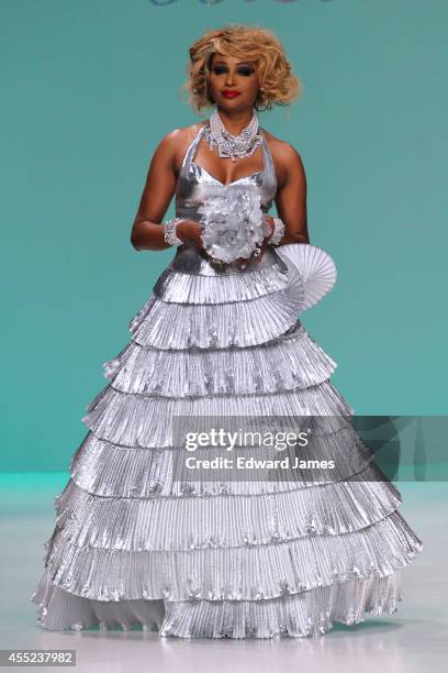 Personality/Model Cynthia Bailey walks the runway at Betsey Johnson during Mercedes-Benz Fashion Week Spring 2015 at The Salon at Lincoln Center on...