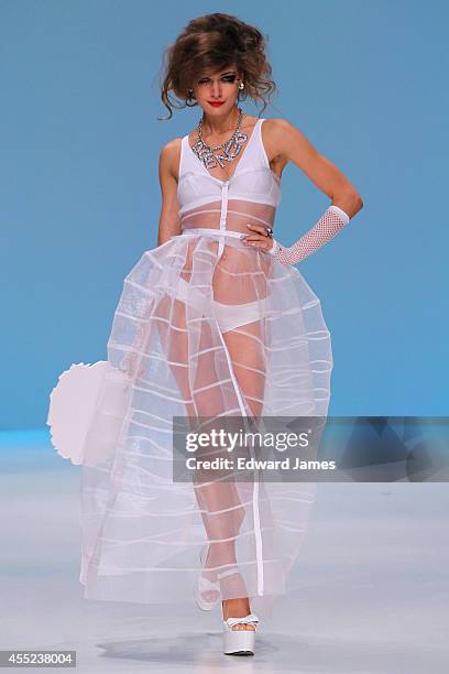 Model walks the runway at Betsey Johnson during Mercedes-Benz Fashion Week Spring 2015 at The Salon at Lincoln Center on September 10, 2014 in New...