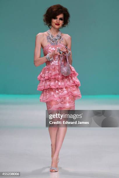 Model walks the runway at Betsey Johnson during Mercedes-Benz Fashion Week Spring 2015 at The Salon at Lincoln Center on September 10, 2014 in New...