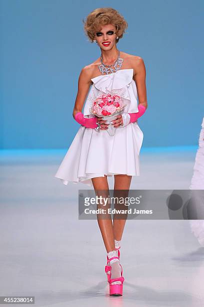 Model walks the runway at Betsey Johnson during Mercedes-Benz Fashion Week Spring 2015 at The Salon at Lincoln Center on September 10, 2014 in New...