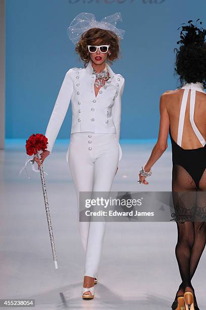 Model walks the runway at Betsey Johnson during Mercedes-Benz Fashion Week Spring 2015 at The Salon at Lincoln Center on September 10, 2014 in New...