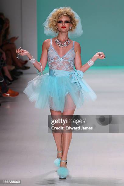 Model walks the runway at Betsey Johnson during Mercedes-Benz Fashion Week Spring 2015 at The Salon at Lincoln Center on September 10, 2014 in New...