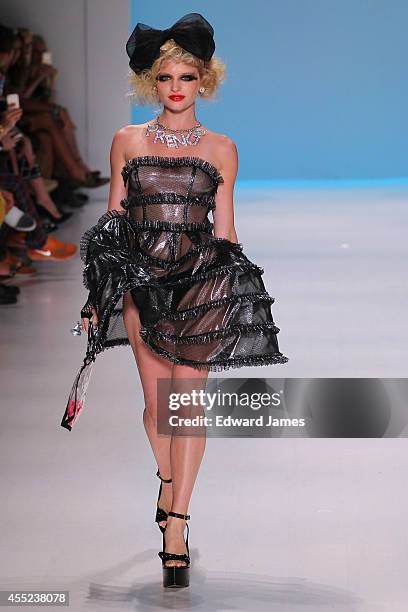 Model walks the runway at Betsey Johnson during Mercedes-Benz Fashion Week Spring 2015 at The Salon at Lincoln Center on September 10, 2014 in New...