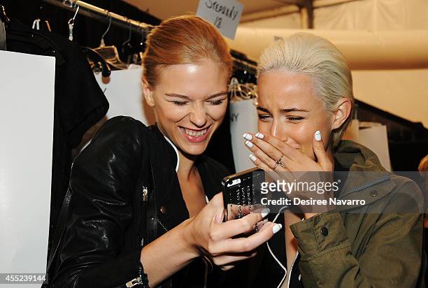 Models take selfies backstage at Erin Fetherston during Mercedes-Benz Fashion Week Spring 2015 at The Salon at Lincoln Center on September 10, 2014...