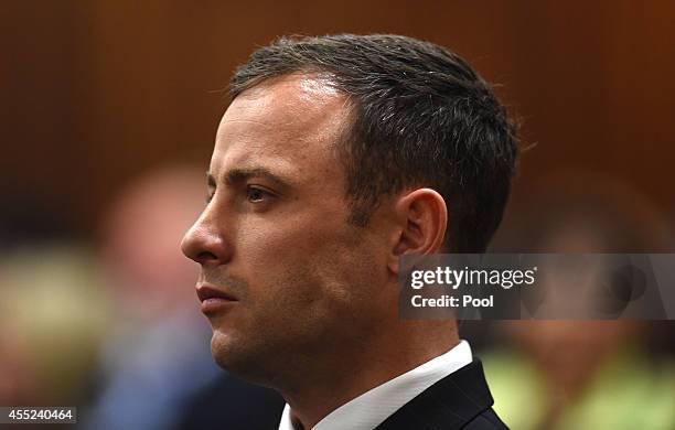 Oscar Pistorius sits in the Pretoria High Court on September 11 in Pretoria, South Africa. South African Judge Thokosile Masipa is due to give her...