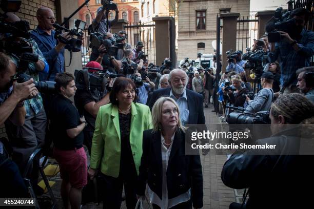 June Steenkamp and Barry Steenkamp arrive at the High Court on September 11, 2014 in Pretoria, South Africa. South African Judge Thokosile Masipa is...