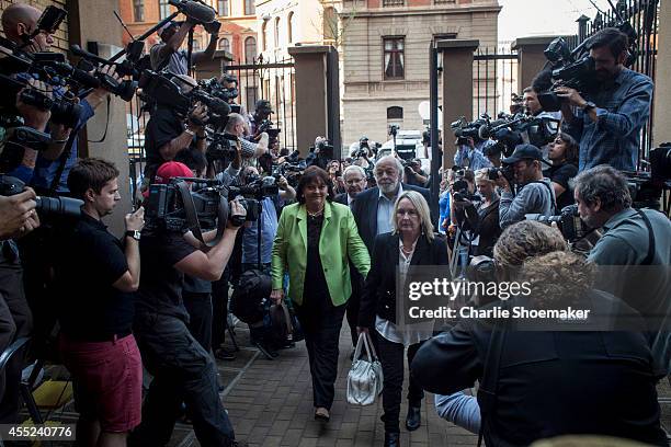 June Steenkamp and Barry Steenkamp arrive at the High Court on September 11, 2014 in Pretoria, South Africa. South African Judge Thokosile Masipa is...