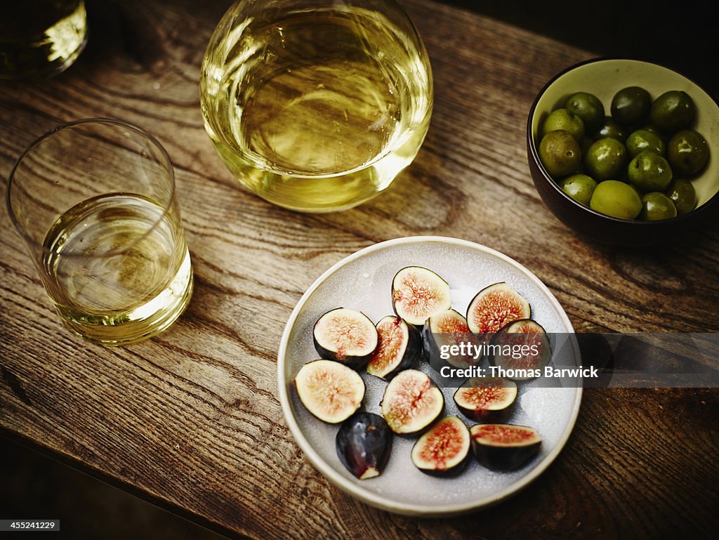 Appetizers and wine on outdoor table