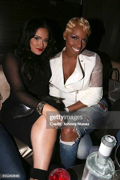 Emily Bustamante and Nene Leakes attend the Trump Models Party at Level R on September 10, 2014 in New York City.