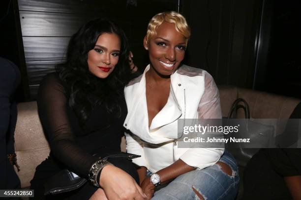 Emily Bustamante and Nene Leakes attend the Trump Models Party at Level R on September 10, 2014 in New York City.