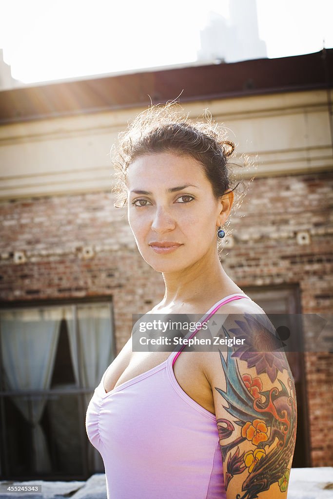 Portrait of woman with tattoos