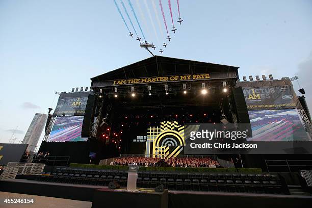 The Red Arrows RAF Display Team fly over the Queen Elizabeth II Park during the Invictus Games Opening Ceremony on September 10, 2014 in London,...