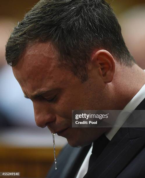 Oscar Pistorius reacts in the Pretoria High Court on September 11 in Pretoria, South Africa. South African Judge Thokosile Masipa has ruled out...