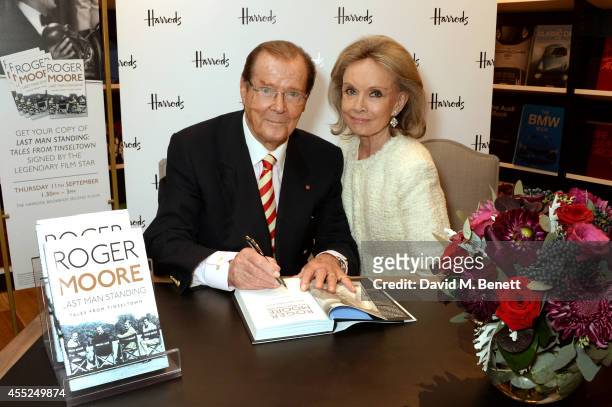 Roger Moore signs copies of his new book "Last Man Standing: Tales from Tinseltown" alongside wife Kristina Tholstrup at Harrods Bookshop on...