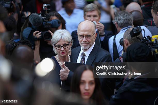 Lois and Arnold Pistorius, the aunt and uncle of Oscar Pistorius, leave North Gauteng High Court on September 11, 2014 in Pretoria, South Africa....