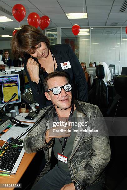 Benjamin Castaldi and Carole Rousseau attend Aurel BCG Charity Benefit Day 2014 on September 11, 2014 in Paris, France.