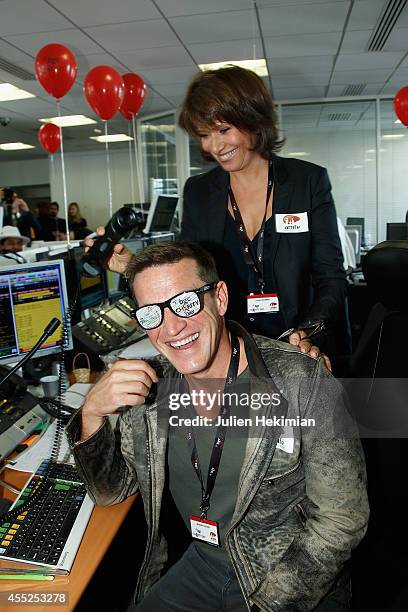 Benjamin Castaldi and Carole Rousseau attend Aurel BCG Charity Benefit Day 2014 on September 11, 2014 in Paris, France.