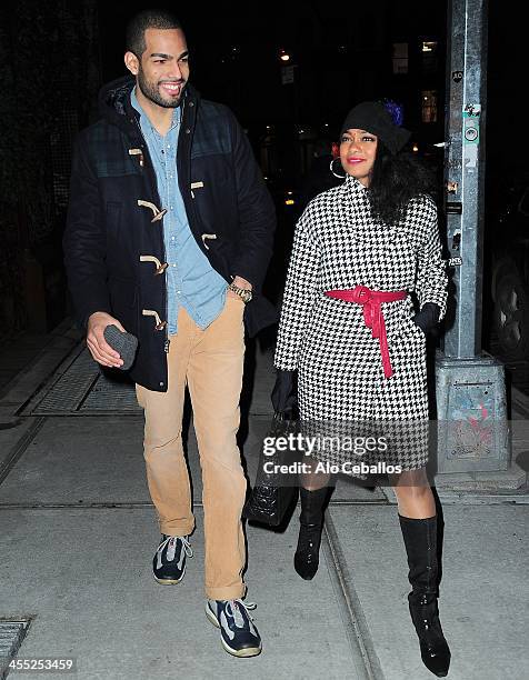 Rey Lopez and Tatyana Ali are seen in Soho on December 11, 2013 in New York City.