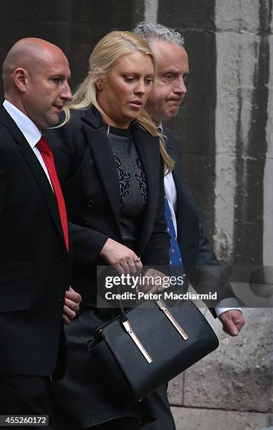 Australian DJ Mel Greig leaves The Royal Courts of Justice on September 11, 2014 in London, England. An inquest is being held into the death of...