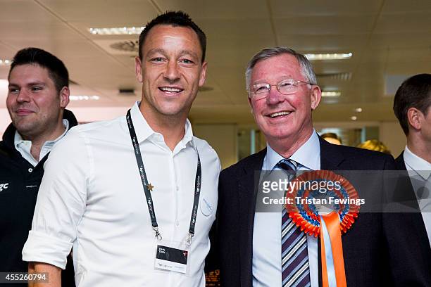 John Terry and Sir Alex Ferguson attend the annual BGC Global Charity Day at BGC Partners on September 11, 2014 in London, England.