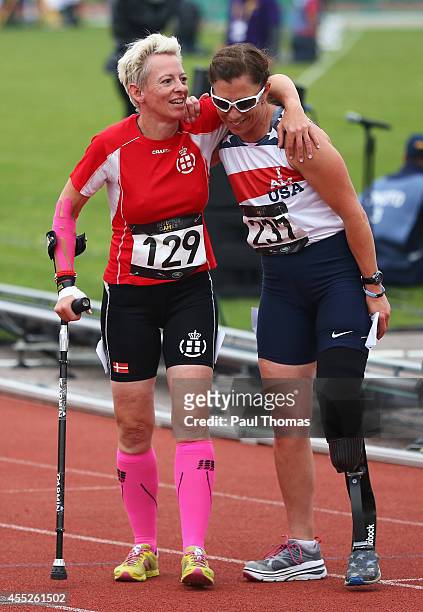 Patricia Collins of the United States celebrates winning the 1500m Women Ambulant IT1 final with Marianne Huche of Denmark during day 1 of the...