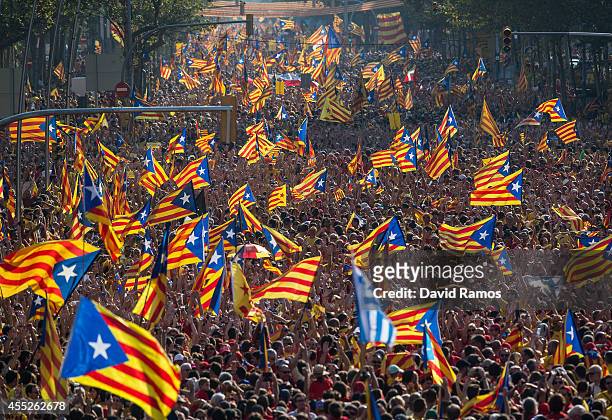 Demonstrators march during a Pro-Independence demonstration as part of the celebrations of the National Day of Catalonia on September 11, 2014 in...