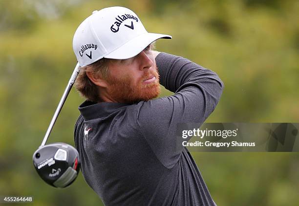 Derek Fathauer watches his tee shot on the 14th hole during the first round of the Nationwide Children's Hospital Championship at the Ohio State...