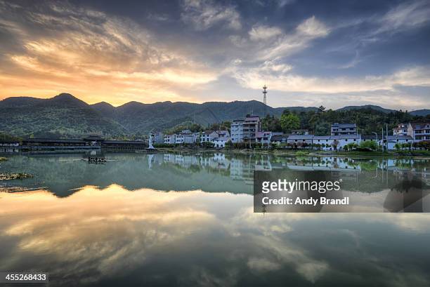 sunset mirror in tonglu county - tonglu county stock pictures, royalty-free photos & images