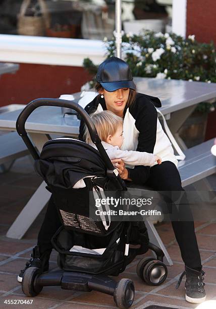 Alessandra Ambrosio and son Noah Mazur are seen on December 11, 2013 in Los Angeles, California.