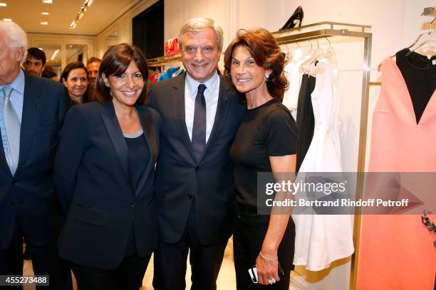 Mayor of Paris Anne Hidalgo, CEO Dior Sidney Toledano and Director of Dior Avenue Montaigne's boutique Sylvie Rousseau attend the "Promenade pour un...