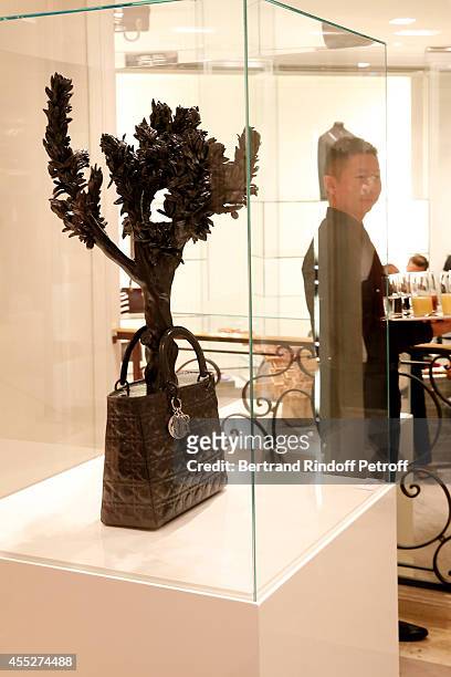 View of work from Tayfun Serttas, Lady dream during the "Promenade pour un objet d'exception". Held at Boutique Dior Montaigne on September 11, 2014...