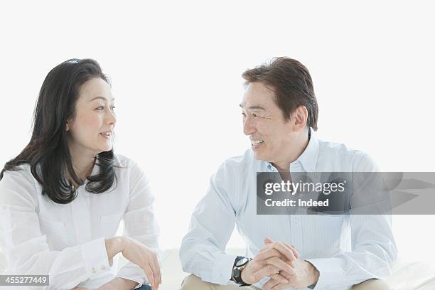 a close middle-aged couple - business mature couple portrait bildbanksfoton och bilder