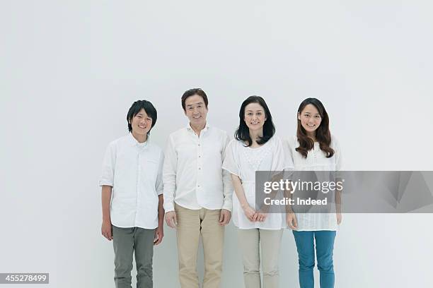 four person family with good relations - four people white background stock pictures, royalty-free photos & images