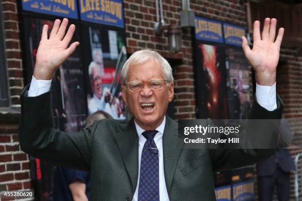 David Letterman jokes around with photographers at "Late Show with David Letterman" at Ed Sullivan Theater on September 11, 2014 in New York City.