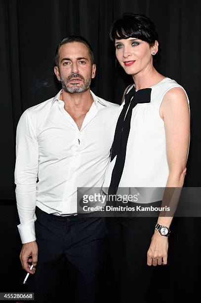 Designer Marc Jacobs and Michele Hicks backstage at the Marc Jacobs fashion show during Mercedes-Benz Fashion Week Spring 2015 at Park Avenue Armory...