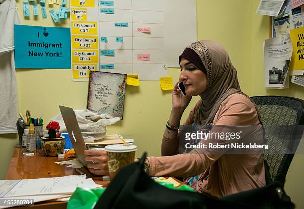 Linda Sarsour, executive director of the Arab-American Association of New York, speaks over the phone September 11, 2014 in the Brooklyn borough of...