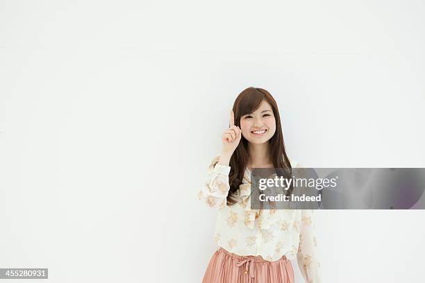 woman dressed in the suit - woman index finger stock pictures, royalty-free photos & images