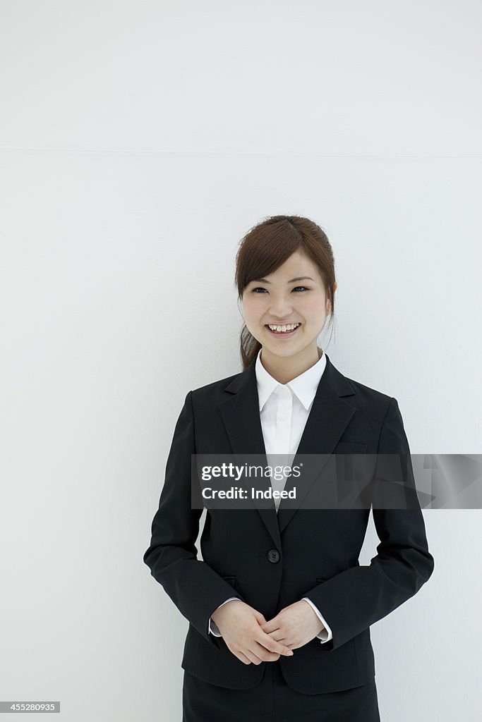 Woman dressed in the suit