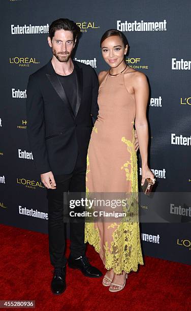 Ashley Madekwe and Iddo Goldberg attend the 2014 Entertainment Weekly Pre-Emmy Party at Fig & Olive Melrose Place on August 23, 2014 in West...