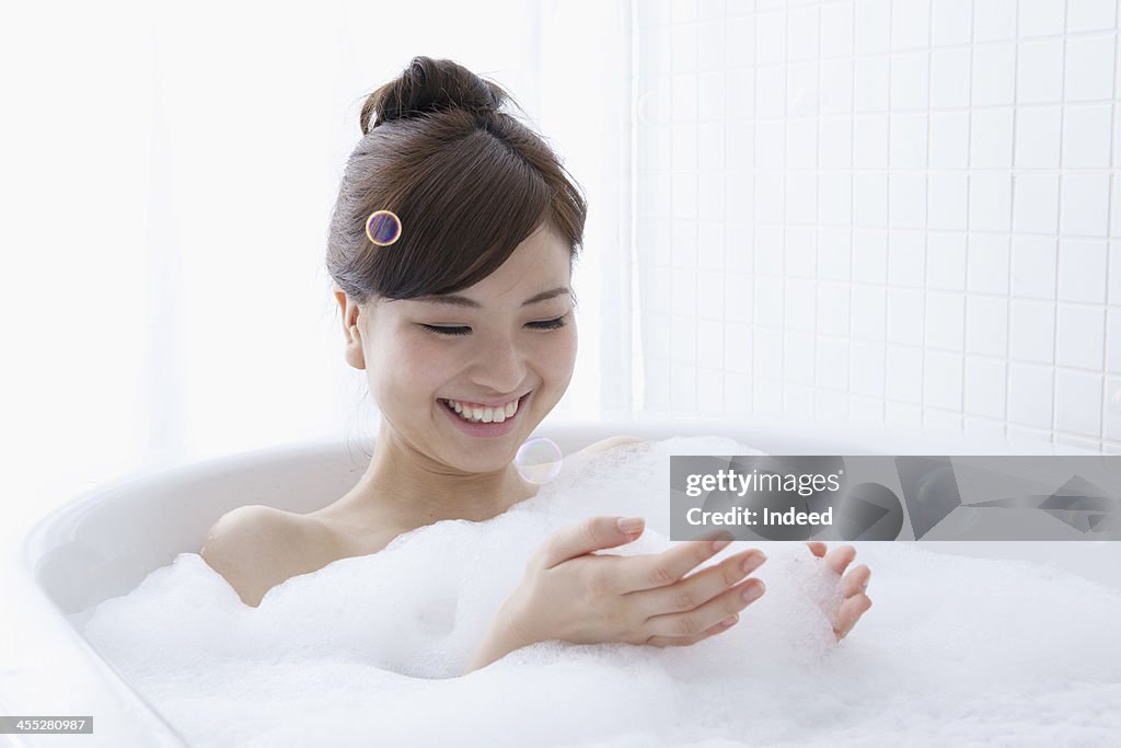 Woman in the bubble bath