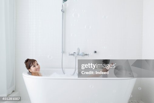 Woman takes a bath Woman takes a bath