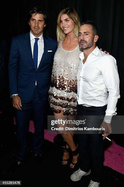 Professional polo player Nacho Figueras, his wife Delfina Blaquier and designer Marc Jacobs attend the Marc Jacobs fashion show during Mercedes-Benz...